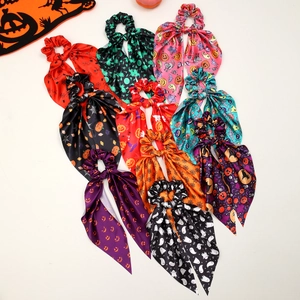 Halloween silk scrunchies set with ribbons featuring pumpkins ghosts and spider webs