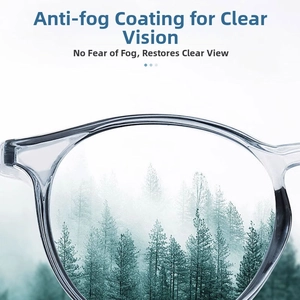 Macro view of anti-fog coated eyeglass lenses showing clear vision against foggy background