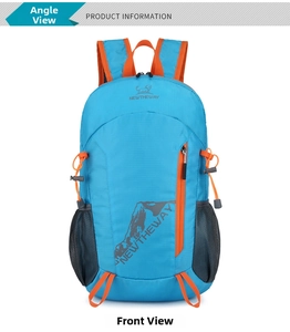 Detail view of the blue sports backpack showing orange zippers and mesh side pockets