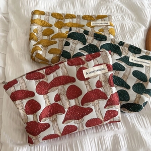 Quilted canvas makeup bags with mushroom patterns and zipper closure for travel
