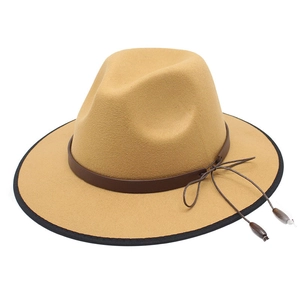 Detailed top view of camel wool fedora hat featuring black piped brim and leather band