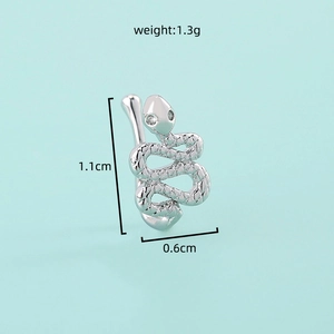 Macro shot of silver snake-shaped nose stud with 1.1cm and 0.6cm dimensions and 1.3g weight