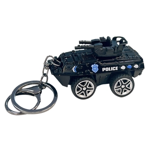Black police armored vehicle keychain toy model with pull-back function and metal ring.