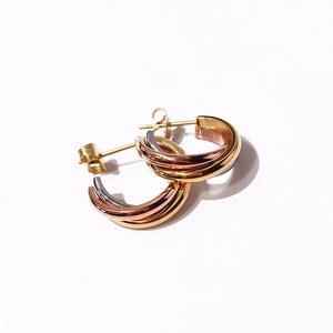 Three-tone interlocking hoop earrings in gold, rose gold, and silver stainless steel
