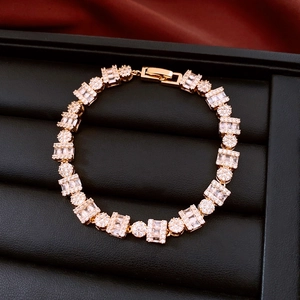 Detailed view of 18k gold plated vintage bracelet with crystals on a jewelry box