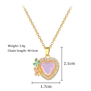 Detail of titanium heart necklace with pink stone, butterflies and sizing dimensions