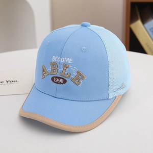 Close-up of light blue mesh baseball cap with embroidered 'BECOME ABLE 1998' text detail