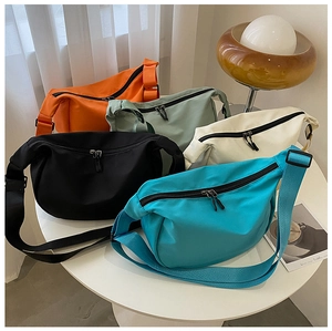 Waterproof nylon crescent crossbody bags in five colors with adjustable shoulder straps