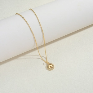 Minimalist gold star necklace with rainbow pendant and sparkling crystal accents