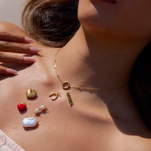 18K gold plated stainless steel necklace featuring pearl, heart, and MAMA letter pendants