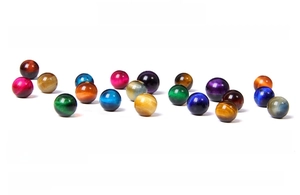Detailed macro view of colorful natural tiger eye stone beads for yoga jewelry making