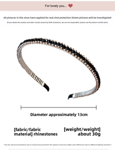 Detail of a thin metal headband with black rhinestones showing dimensions of 13cm diameter