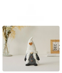Knitted coffee gnome doll with heart hat and bean buttons for home decor