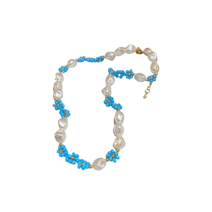 Floral beaded necklace with blue seed beads and white baroque pearls for women