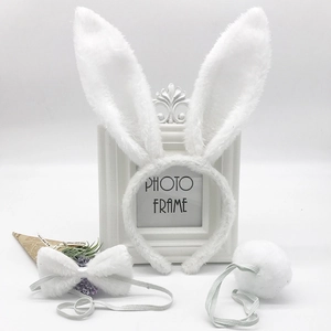 Three-piece white plush bunny accessory set with long ears headband, bowtie, and tail