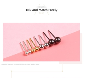 Detail of round ball stud earrings in silver gold rose gold and black steel finishes