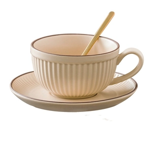 Nordic matte ceramic coffee cup and saucer set with vertical grain and gold spoon