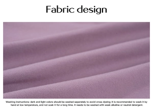 Macro view of light purple knitted fabric texture and washing instructions on a label