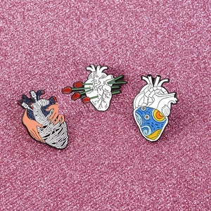Three creative enamel heart brooches with tulip and Starry Night art on pink sequins