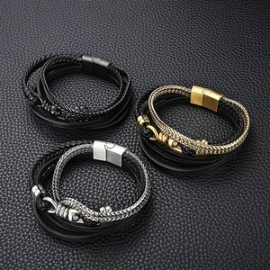 Close-up of multilayer braided leather bracelets with stainless steel clasps in three colors
