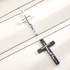 Detail of wooden cross necklaces with Faith inscription and grey metal bead chains