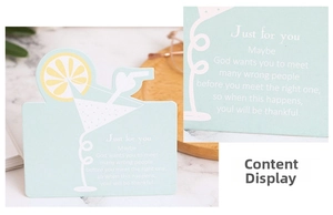 Detail showing mint green greeting card with lemon illustration and inspirational text