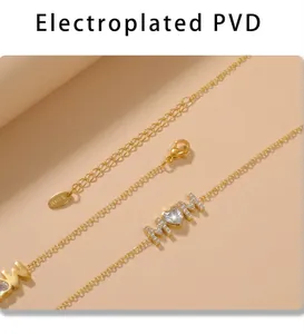 Macro detail of 18K gold plated MOM heart bracelet with cubic zirconia and PVD finish