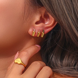 Golden drink cup earrings with colorful zircon and heart 'Mom' ring set on model