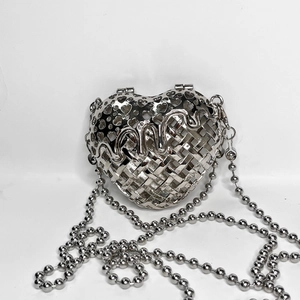 Silver heart-shaped metal hollow woven clutch bag with polished bead chain strap