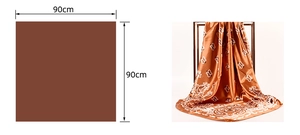 Close-up of 90cm square satin scarf with paisley pattern in caramel bronze color