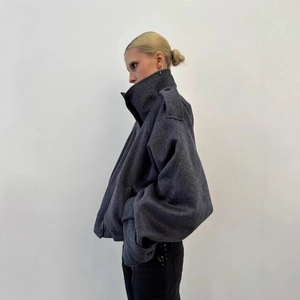 Minimalist oversized wool blend coat with a high collar and epaulettes in dark grey