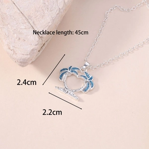 Silver tropical necklace with dual palm trees forming a heart shape and blue inlay