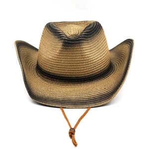 Detail of western cowboy straw hat featuring gradient weave and adjustable chin strap