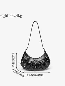 Detailed view of crocodile pattern bag with silver studs and size dimensions 29x9x16cm