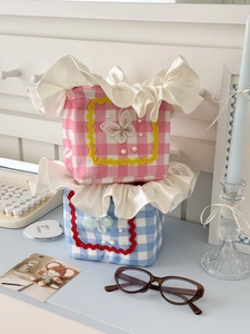 Plaid storage baskets with ruffle lace trim and butterfly embroidery in pink and blue