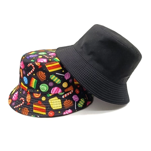 Black and cartoon candy print bucket hats for sun protection and outdoor travel