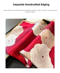 Detailed view of hand-rolled edges and 3D rose pattern on silk square scarf