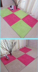 Detail of interlocking plush foam floor mats in vibrant colors with EVA foam base