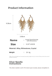 Close-up detail of golden tassel earrings with crystal fringe and silver needle studs