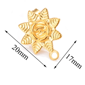 Macro detail of 20mm golden sunflower metal charm connector for DIY jewelry making