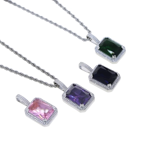 Detail of four colorful square crystal pendants with silver twist chain hip hop style