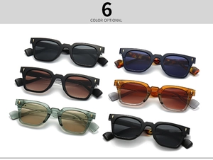 Multiple colors of vintage thick frame sunglasses with golden arrow rivet details