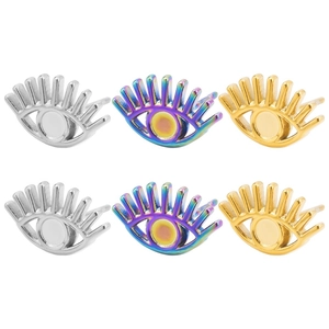 Detail of eye-shaped stainless steel earring charms in silver, gold, and rainbow finishes