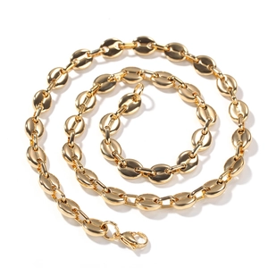 Macro shot of gold-plated coffee bean link necklace with secure lobster clasp detail