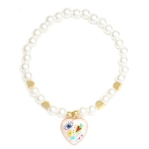 Detail of beaded bracelet with faux pearls and pop-art evil eye heart pendant charm