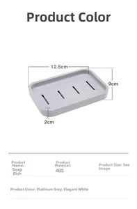 Macro detail of a minimalist gray ABS soap dish with four drainage holes and dimensions