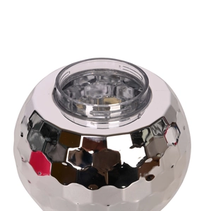 Detailed macro view of the silver disco ball cup top with screw thread and mirror finish