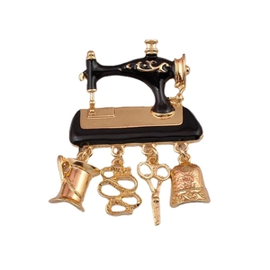 Vintage black sewing machine brooch with dangling scissors and thimble charms for coats