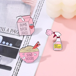 Pink enamel pins set with juice box and ramen bowl designs for fashion bags