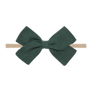 Elastic nylon baby headband featuring a large dark green linen bow for infant girls